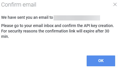 Confirm email dialog from HaasOnline cryptocurrency trading platform, prompting user to check inbox and confirm API key creation.